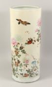 A LARGE JAPANESE PORCELAIN STICK STAND painted with flowers. 24ins high.