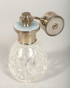A SILVER MOUNTED CUT GLASS SCENT BOTTLE