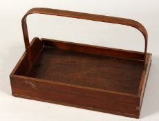 A 19TH CENTURY MAHOGANY BOOK CARRIER with looped handles. 12ins wide.