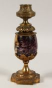 A GOOD 19TH CENTURY BLUE JOHN AND GILT METAL CANDLESTICK on a shaped base. 8ins high.