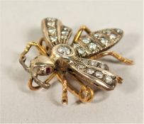 A DIAMOND BEE BROOCH.
