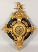 A VERY GOOD ORNATE 19TH CENTURY FRENCH ORMOLU MOUNTED WALL CLOCK with cupids, flowers and scrolls.