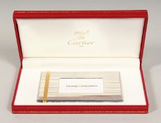 A GOOD CARTIER CALLING CARD HOLDER in original red box.