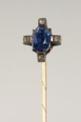 A SAPPHIRE AND DIAMOND TIE PIN, cased.