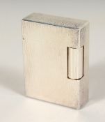 A DUPONT SILVER GAS LIGHTER in a case. No. IOP875