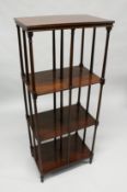 A GOOD 19TH CENTURY MAHOGANY FOUR TIER WHAT-NOT in three sections, each with six turned supports