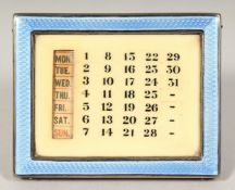 A SILVER AND BLUE ENAMEL CALENDAR 2.25ins x 3.5.ins Birmingham 1930.