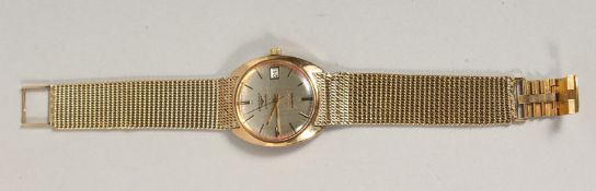 A GENTLEMAN'S 9CT GOLD LONGINES AUTOMATIC ADMIRAL, DAY, DATE WRISTWATCH in original box.