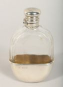 A VICTORIAN SILVER AND GLASS WHISKY FLASK London 1879.