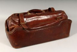 A MAPPIN AND WEBB LEATHER AUCTIONEERS BAG with leather straps. 22ins long.