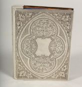 A GOOD VICTORIAN SILVER FITTED PURSE. Chester 1897, in a leather case.