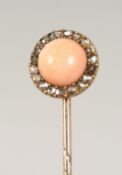 A DIAMOND SET OPAL TIE PIN, cased.