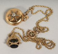 A GOOD LADIES 18K GOLD COCKTAIL PENDANT WATCH inset with a diamond star, on a long chain with fob.