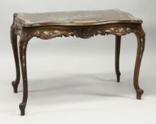 A SUPERB CHINESE ROSEWOOD AND MOTHER OF PEARL INLAID CENTRE TABLE, serpentine edges with crossbanded