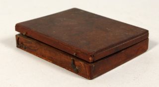 A SMALL WOODEN SPECIMEN BOX with twelve compartments. 4.75ins x 3.75ins.