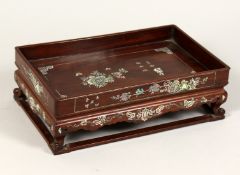 A CHINESE RECTANGULAR TRAY STAND inlaid with mother of pearl. 11.5ins long , 7 ins wide , 3.5ins