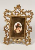 A GOOD 19TH CENTURY CONTINENTAL PORCELAIN PLAQUE, oval head and shoulders of a boy. 3ins x 2.5ins in