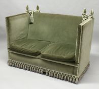 A GOOD KNOLL VELVET SETTEE with drop ends and four loose cushions. 4ft 6ins long, 2ft 6ins deep.