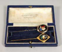 TWO PIETRO DURA TIE PINS, cased, Daniel Desbois & Sons.