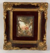A FRAMED MINIATURE OF A WOMAN ON A SWING.