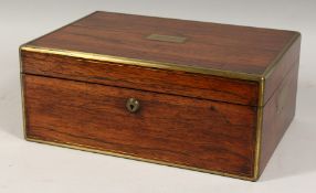 A SUPERB WILLIAN IV ROSEWOOD TOILET BOX with brass handles and silver top bottles, manicure set