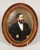 A GOOD 19TH CENTURY CONTINENTAL PORCELAIN PLAQUE, 3/4 length of a man in a black coat. 7ins x 5ins