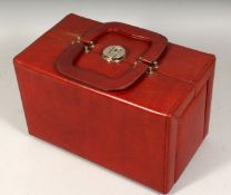 A LEATHER FOLDING VANITY CASE with double handles. 12ins long.