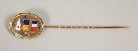 A GOLD AND ENAMEL SIGNAL TIE PIN set with four diamonds, three pendants, cased, H. James,