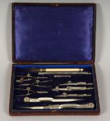 H J BORTON SET OF DRAWING INSTRUMENTS in a leather case.