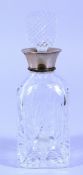 A SMALL CUT GLASS DECANTER AND STOPPER with silver band. Birmingham.