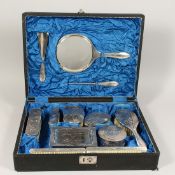 A GOOD 19TH CENTURY CHINESE SOLID SILVER BAMBOO DRESSING TABLE SET by TUCKCHAN, in a leather case,
