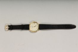 A VACHERON & CONSTANTIN GENEVA GOLD DAY DATE WATCH with leather strap