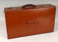 A GENTLEMAN'S LEATHER TRAVELLING SUITCASE by FINNIGENS, LONDON, with silver top bottles, initials
