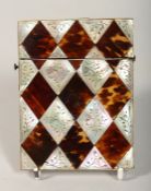 A MOTHER OF PEARL AND TORTOISESHELL CALLING CARD CASE.