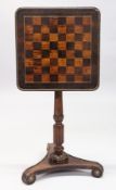 A 19TH CENTURY ROSEWOOD SATINWOOD AND ORMOLU MOUNTED GAMES TABLE, with a rounded square top inlaid