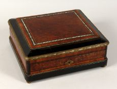 A 19TH CENTURY BURR WALNUT BOX inlaid with mother of pearl with blue silk interior. 12ins long.