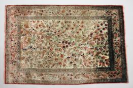 A PERSIAN DESIGN PART SILK TREE OF LIFE RUG. 5ft 2ins x 3ft 5ins