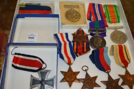 A WWII medal with South East Asia Bar awarded to W.O. J. Nutall 1456558, RAF, together with other