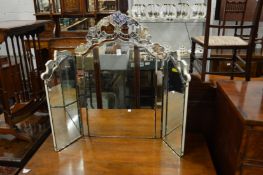 A Venetian style folding dressing table mirror.