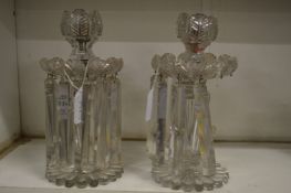 A pair of cut glass table lustres (AF).