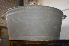 An old galvanized tin bath.