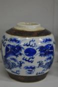 A Chinese blue and white dragon jar.