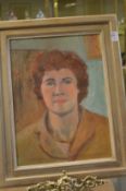 A bust length portrait of a red headed lady, oil on canvas.