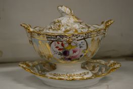An English porcelain boat shaped tureen and cover.