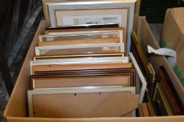 A box of picture and photograph frames.