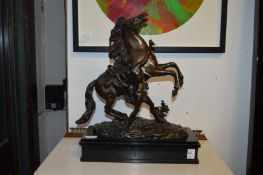 After Coustou, a good pair of cast bronze ‘Marley Horses’ on marble bases, one engraved Africa,