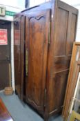 An 18th century French walnut armoire.