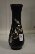 A Chinese inlaid wooden vase.
