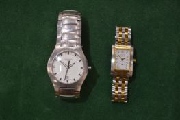 A gent's and ladies' Longines wristwatch.