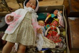 Various dolls.